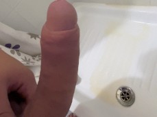 Smooth jock with a big, thick, uncut dick pissing hard in the shower 0041-1 gif