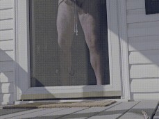 Looked in on my neighbor and found him busy painting the front door 0217-1 gif